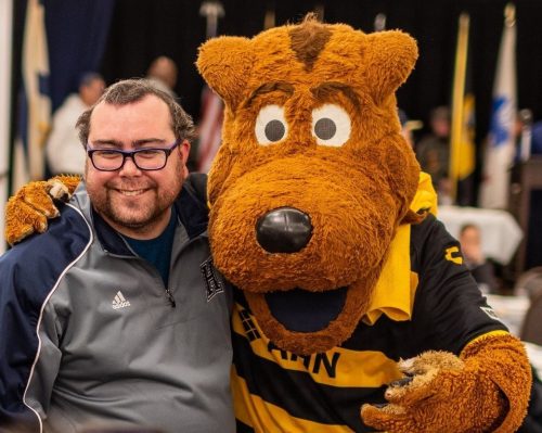 AMO-with-an-individual-at-Sports-Luncheon