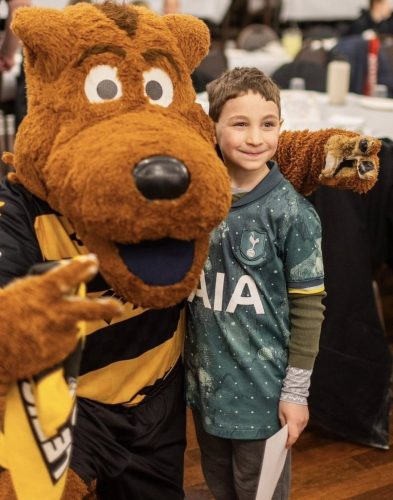 Riverhounds-Amo-and-kid-at-2026-Sports-Luncheon